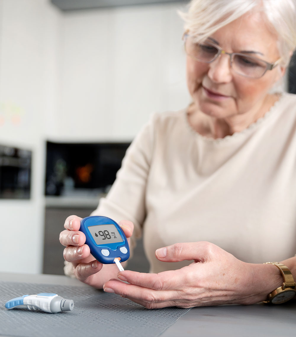 An older lady doing her diabetes check